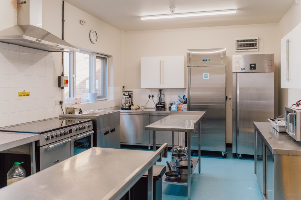 Hospice kitchen with professional catering equipment