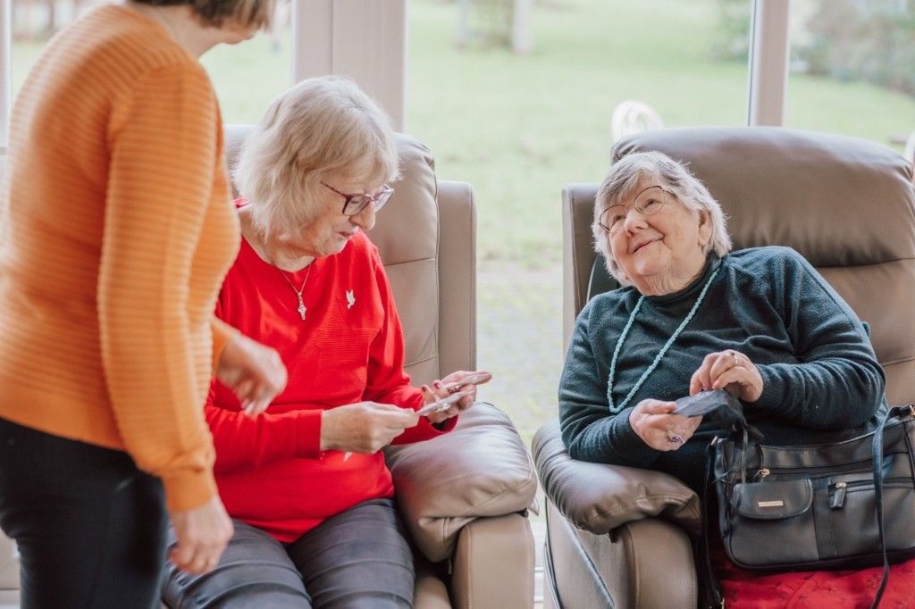Two people chatting comfortably during a counselling support session