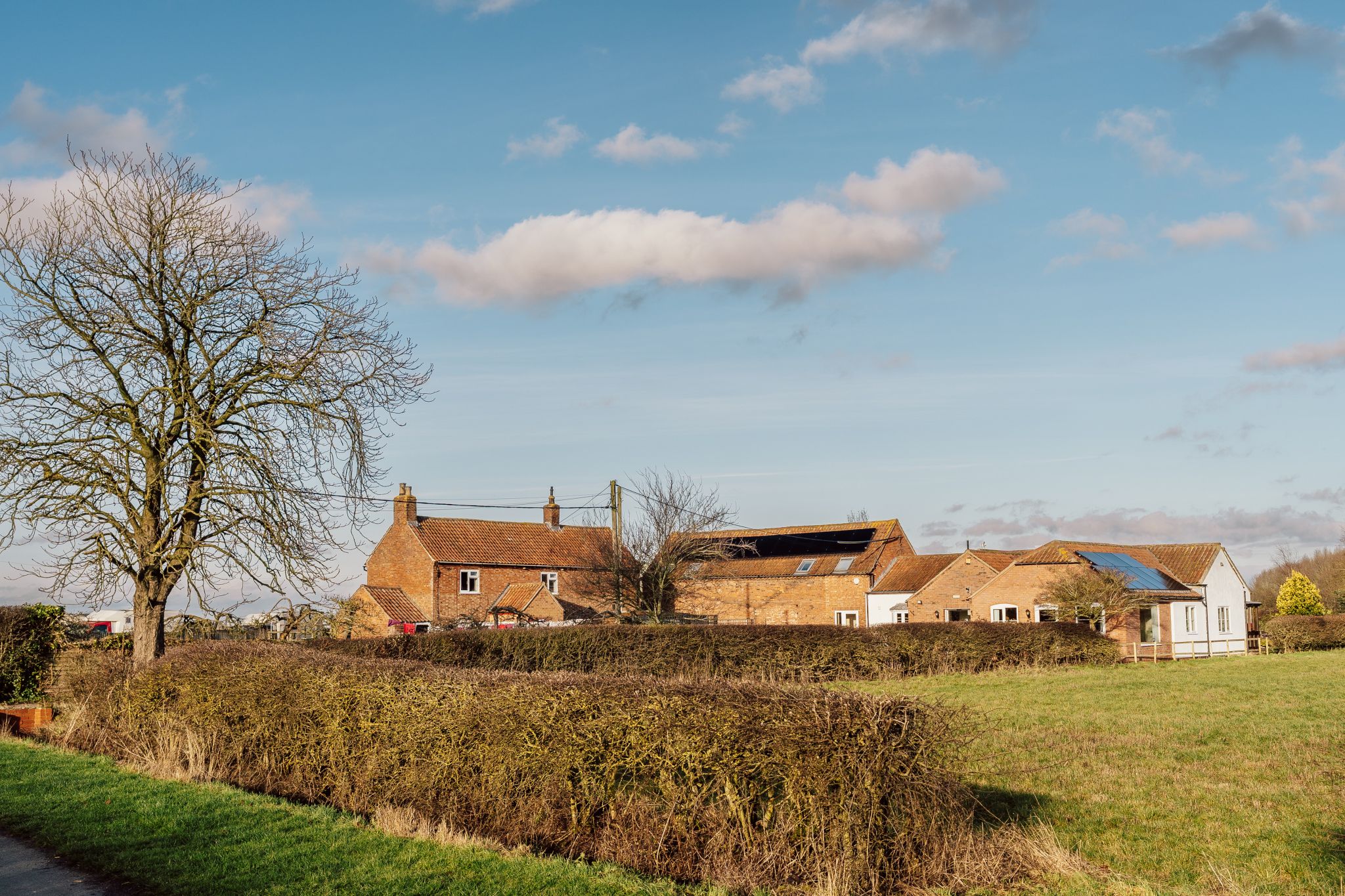 A view of the hospice building in a rural setting